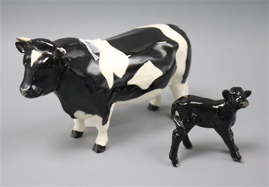 A Beswick Friesian bull Ch. Coddington Hilt Bar, no. 1439A and an Aberdeen Angus calf, no. 1406A